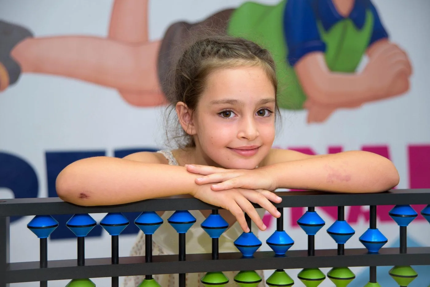 A girl at the abacus in a SuperClever class